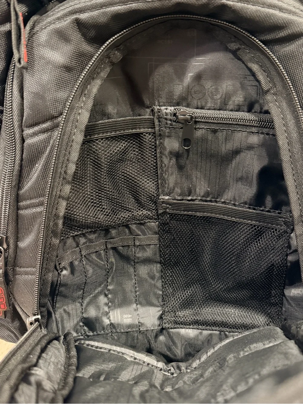 OGIO Black Backpack with Red Zipper Accents